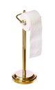 Gold toilet paper holder standing isolated on white Royalty Free Stock Photo