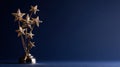 Gold Trophy Featuring Shooting Stars for First Place in a Competition Set on Dark Blue Background With Ample Space for Royalty Free Stock Photo