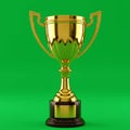 A gold trophy with two handles, made of shiny metallic material, sits on a round woode Royalty Free Stock Photo