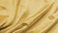 Gold velvet background or golden yellow velour flannel texture made of cotton or wool with soft fluffy velvety satin fabric cloth Royalty Free Stock Photo