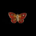 Gold vintage brooch covered with colored enamel in the shape of a butterfly