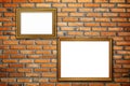 Gold vintage photo frames on red brick wall Royalty Free Stock Photo