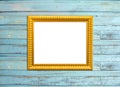 Gold Vintage picture frame on blue wood background Royalty Free Stock Photo