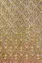 Gold wall laithai of temple at thailand Royalty Free Stock Photo