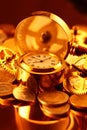 Gold watches, coins, gears and magnifying glass