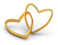 Gold wedding rings forming a heart, symbolizing love. Two golden rings isolated on white Royalty Free Stock Photo