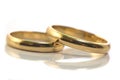 Gold wedding rings isolated on Royalty Free Stock Photo