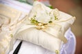 Gold wedding rings on a pillow Royalty Free Stock Photo
