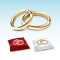 Gold Wedding Rings on Red White Satin Pillow Royalty Free Stock Photo