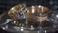 Gold wedding rings. Transfusion of light on rings. Gold wedding rings