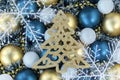 Gold, white and blue Christmas balls with gold Christmas tree and snowflakes. Christmas background. New Year or Xmas concept. Top Royalty Free Stock Photo