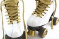 Gold and white rollerskates