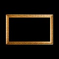 Gold wide wooden frame isolated on black Royalty Free Stock Photo