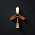 Gold Wind turbine icon isolated on black background. Wind generator sign. Windmill for electric power production. Long