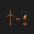 Gold Wind turbine and light bulb with leaves as idea of eco-friendly source of energy icon isolated on black background Royalty Free Stock Photo