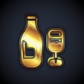 Gold Wine bottle with glass icon isolated on black background. Vector Royalty Free Stock Photo