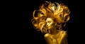 Gold Woman skin and hair, Beauty model girl with Golden make up, Long hair on black background. Gold glowing skin Royalty Free Stock Photo