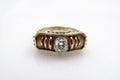 Gold womenÃÂ´s vintage design finger ring witch diamonds and floral motifs