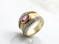 Gold womenÃÂ´s vintage design finger ring witch diamonds and gem Royalty Free Stock Photo
