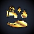 Gold Wudhu icon isolated on black background. Muslim man doing ablution. Vector