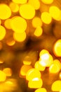 Gold yellow abstract background with bokeh defocused blurred lights. Royalty Free Stock Photo