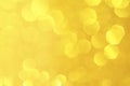 Gold,yellow abstract light background, Gold  bokeh shining lights, sparkling glittering Christmas lights.Season greeting backgroun Royalty Free Stock Photo