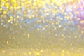 Gold, yellow,blue,pink abstract light background, Golden shining lights, sparkling glittering Christmas lights. Blurred abstract h Royalty Free Stock Photo