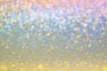 Gold, yellow,blue,pink abstract light background, Golden shining lights, sparkling glittering Christmas lights. Blurred abstract h Royalty Free Stock Photo