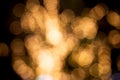 Gold or yellow bokeh texture background with glowing and illuminated, holiday and festive for celebration.