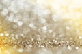 Gold, yellow,brown abstract light background, Golden shining lights, sparkling glittering Christmas lights. Blurred abstract holid