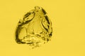 Gold yellow oil bubble background. Liquid drops in macro Royalty Free Stock Photo
