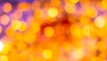 Gold yellow and red abstract background with bokeh defocused blurred lights. Royalty Free Stock Photo