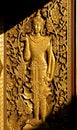 Golde thai art Culture door are Deva and flowers in the temple of thailand isolate on white background Royalty Free Stock Photo