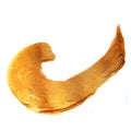 Golden acrylic painted brush. Shining textured gold stain
