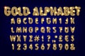 Golden alphabet on a dark background