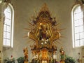 Golden altar with rays of pilgrimage church ornamental