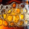 Golden Amber Bubbles Forming a Honeycomb Pattern Royalty Free Stock Photo