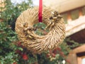 Golden angels on a straw wreath for Valentin& x27;s day. Royalty Free Stock Photo