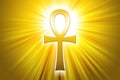 Golden Ankh with sunbeams