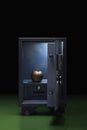 Golden apple in a safe. Conceptual image