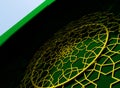 Golden arabic ornament on the green wall with islamic door Royalty Free Stock Photo