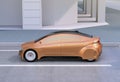 Golden autonomous car parking at the side of the road Royalty Free Stock Photo