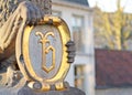 Golden B in the claws of a stone lion, Bruges Royalty Free Stock Photo