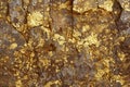 Golden background. Gold nuggets and rocks with cracks. Neural network ai generated Royalty Free Stock Photo
