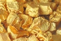 Golden Background. Ingots or Nuggets of Pure Gold. Gold leaf. Te Royalty Free Stock Photo