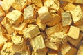 Golden Background. Ingots or Nuggets of Pure Gold. Gold leaf. Te Royalty Free Stock Photo