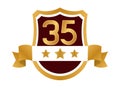 golden badge with number thirtyfive