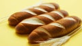 Golden baguettes and wheat ears Royalty Free Stock Photo