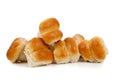 Golden baked dinner rolls on a white background Royalty Free Stock Photo