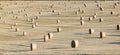 Bale of straw after harvest at the field Royalty Free Stock Photo